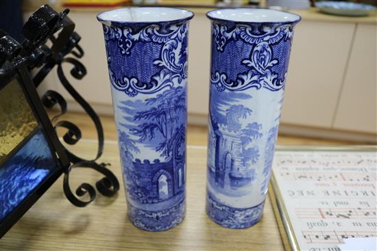 A modern Persian style two handled vase and a pair of blue and white sleeve vases